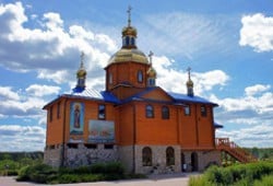 На честь Афонської ікони Божої Матері ставропігійний жіночий монастир (смт. Чоповичі (ур. Кип'яче), Житомирська обл.)